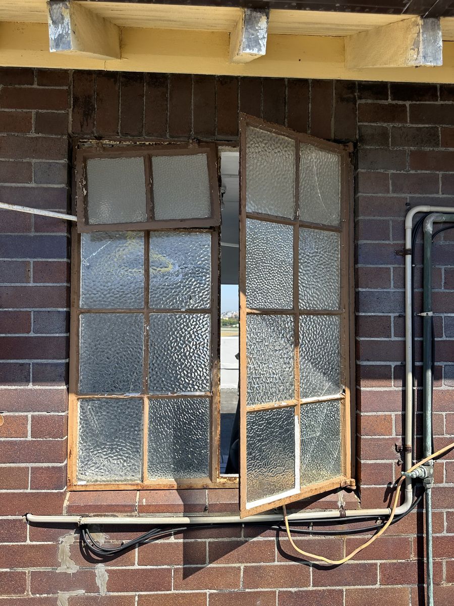 Rusted steel casement sash on the Randwick building